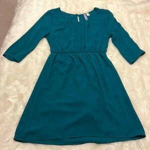 Francesca’s blue green dress